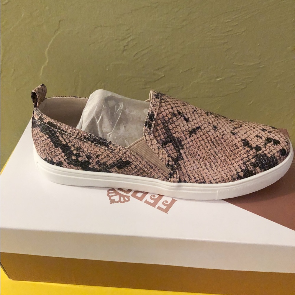 Snake print boat shoe